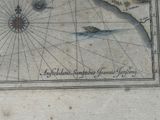 an old map with a picture of a ship on it