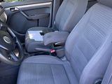 the interior of a car with two seats and a steering wheel