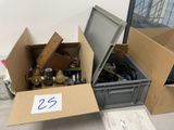 many boxes of assorted items sitting on the floor