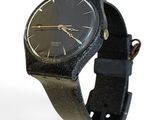 a black watch with a black band on a white background