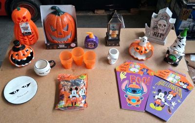 a table with various halloween decorations and decorations on it