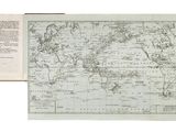 une vieille carte du monde avec un livre ouvert