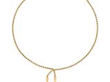 a gold necklace with two spike charms on a chain