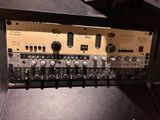 a close up of a radio with many knobs on it