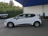 a small white car parked in a parking lot