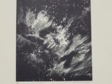 an image of a black and white photograph of a wave