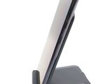 a cell phone that is sitting on top of a stand