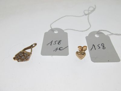 boucle d'oreille monture or 750°/°° sertie de pierres, bos… - Photo 1