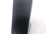a cell phone that is sitting on a stand