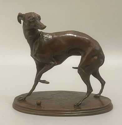 bronze statue of a greyhound dog running on a wooden base