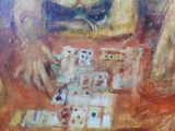 painting of a woman sitting at a table playing cards