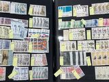 many different stamps on the pages of a book