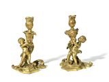 pair of antique brass figurines of a boy and a girl