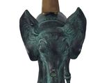 statue of an elephant with a cone on top of it ' s head