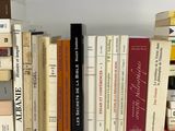 a lot of books that are sitting on a table