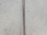 an image of a clock with a pendulum on a white surface