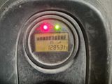 a close up of a car ' s dashboard with a digital display
