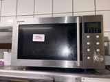 a microwave that is sitting on top of a counter