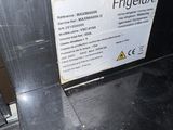 a sign on the side of a machine that says frieluxx