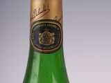 an old bottle of wine with a label on it