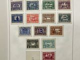 an open book with a bunch of different stamps on it
