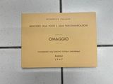a sign on the floor that says omagio