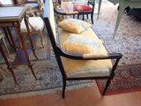 an image of a living room with a couch and chairs