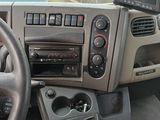 a car dashboard with a steering wheel and a dash board