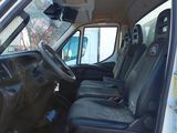 a picture of the inside of a truck with the driver ' s seat up