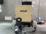 a machine that is sitting on the floor in a room