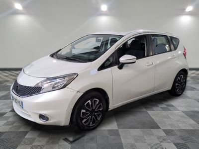 a picture of a white car parked in a garage