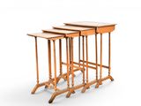 three tables that are sitting side by side on a white surface