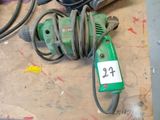 a green drill with a number on it on a table