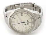 a silver watch with a white face on a silver bracelet