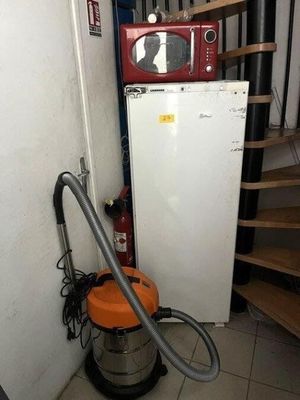 an image of a kitchen with a microwave and a dryer