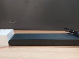 an image of a box with headphones and a speaker on a table