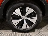 a close up view of a car ' s tire on the floor
