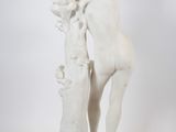 statue of a woman holding a basket of flowers on a white background