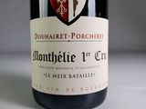 a bottle of wine that is sitting on a table