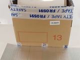 a box that has a computer in it on a table