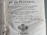 an old book with writing on it sitting on top of a table