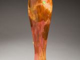 a glass vase that is sitting on a table