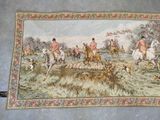 a picture of a tapestry with a picture of a hunting scene