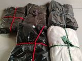 a pile of wrapped presents sitting on a table