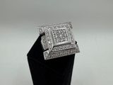 a close up of a diamond ring in a black box