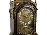 a clock that is sitting on top of a table