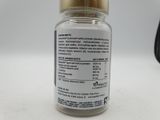 a bottle of vitamin supplement sitting on a table