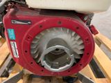 a picture of a red and white engine on a pallet