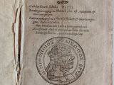 an old book with a picture of a man in a crown on it