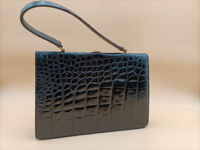 Petit sac noir croco porté main